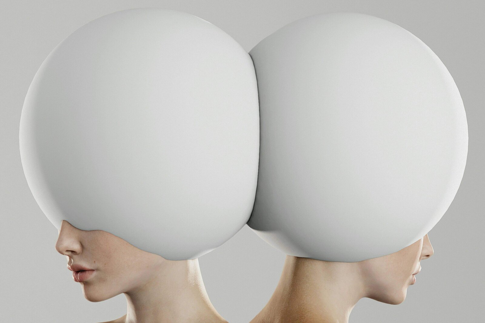 Durch A/B-Testing zwei Design-Versionen miteinander vergleichen - wie hier zwei Köpfe